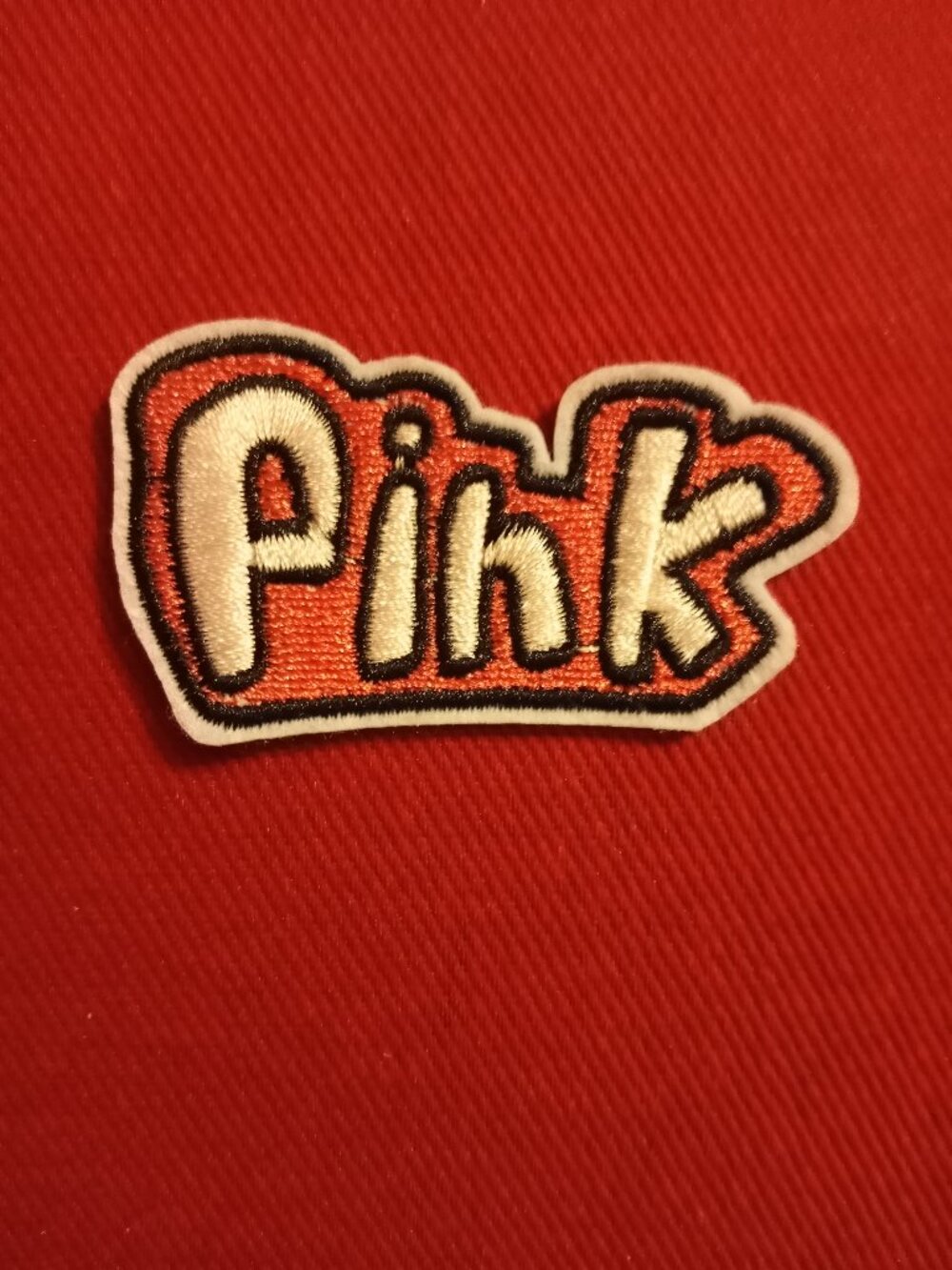 Pink embroidered iron on patch